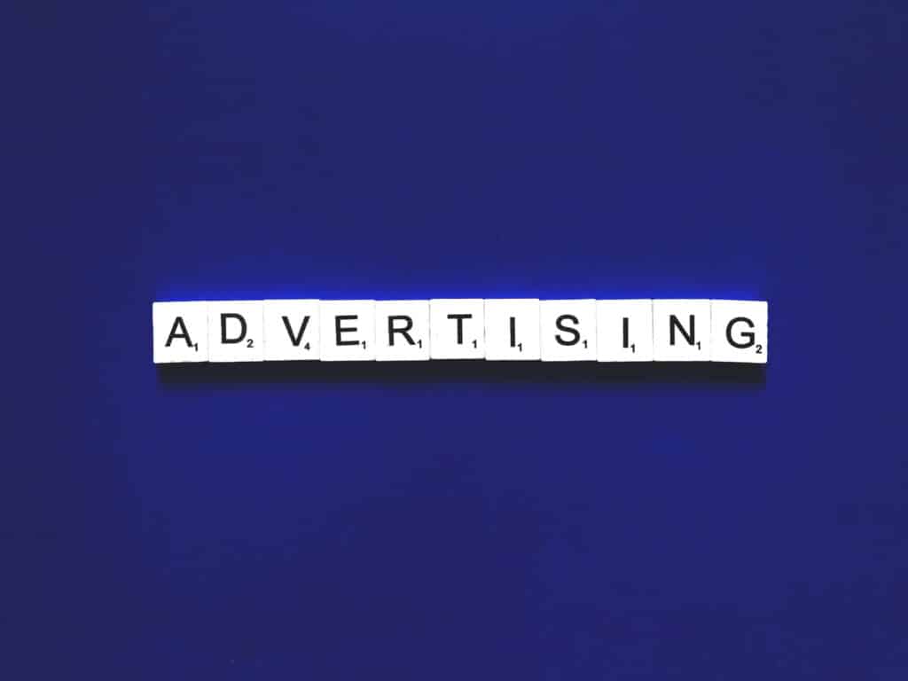 "Paid advertising" spelled out in word tiles